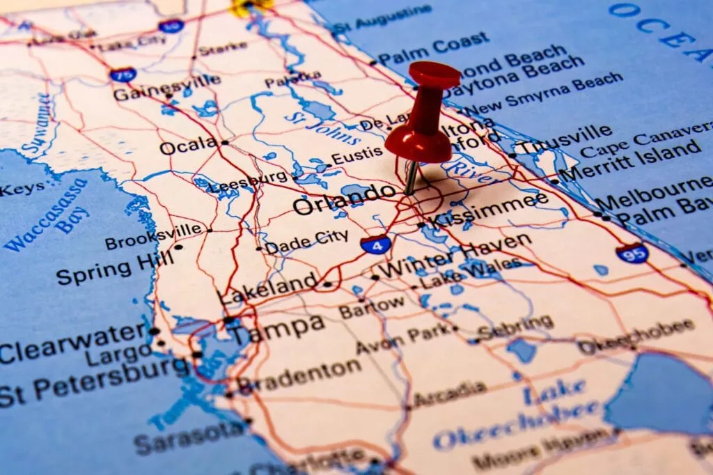 A close-up of a Florida state map with a red push pin marking the city of Orlando, highlighting local business service area coverage in Orlando, Florida.