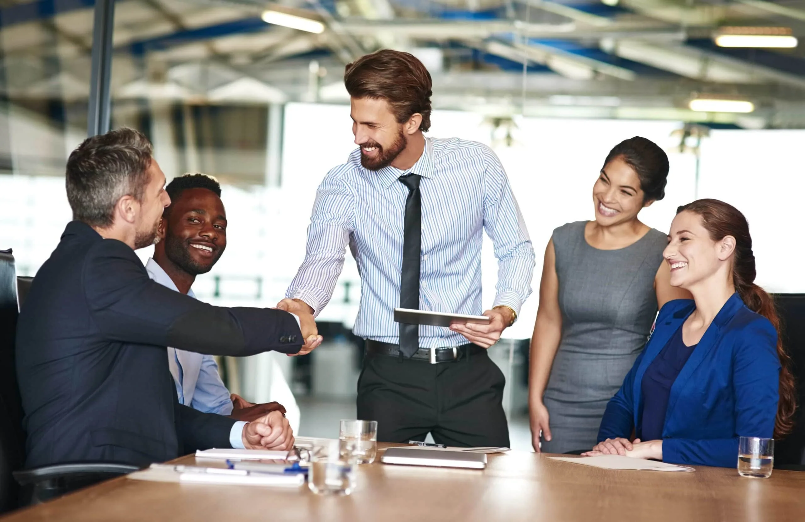 A collaborative business meeting highlighting managerial effectiveness and leadership strategies to build employee loyalty in Orlando, FL. Managerial Effectiveness