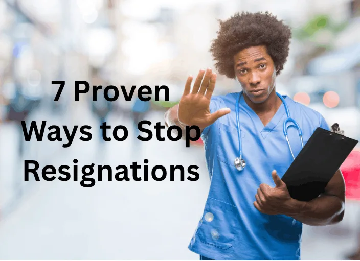 A male healthcare professional in blue scrubs holding a clipboard and signaling "stop" with his hand, illustrating nurse retention strategies for hospitals in Central Florida.