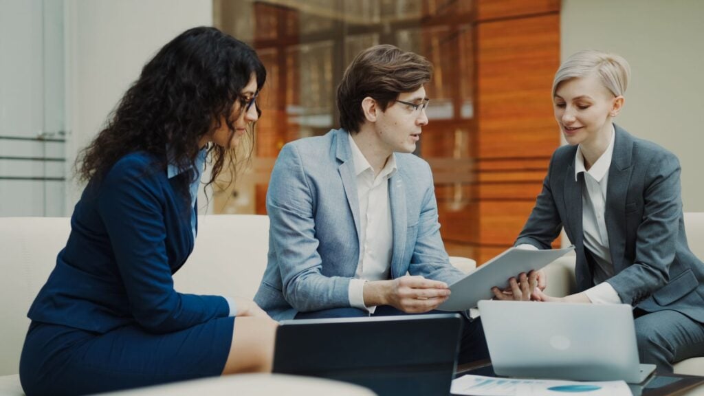 manager reviewing a culture amp engagement score dashboard on a laptop